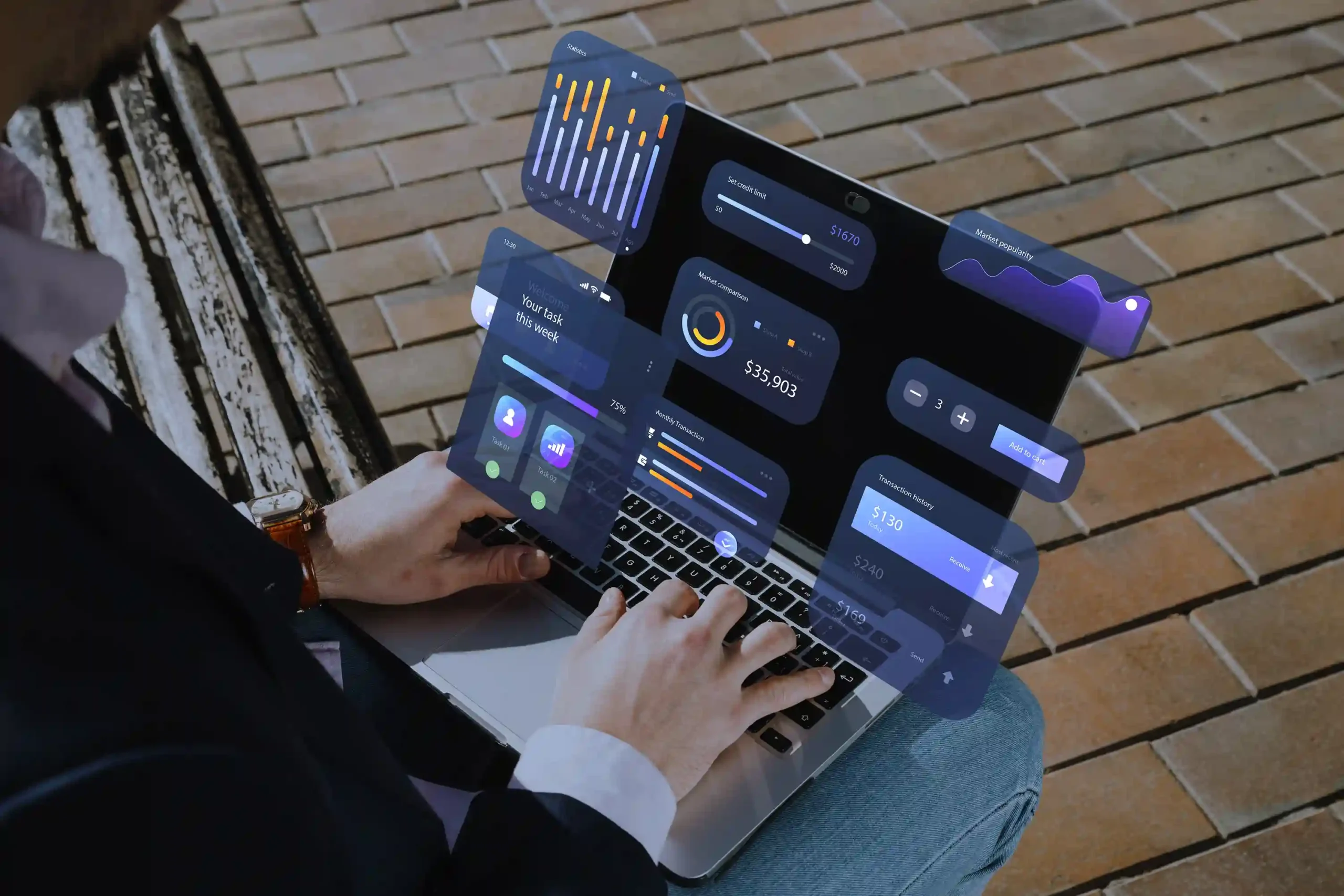 Person using laptop with digital data analytics dashboards